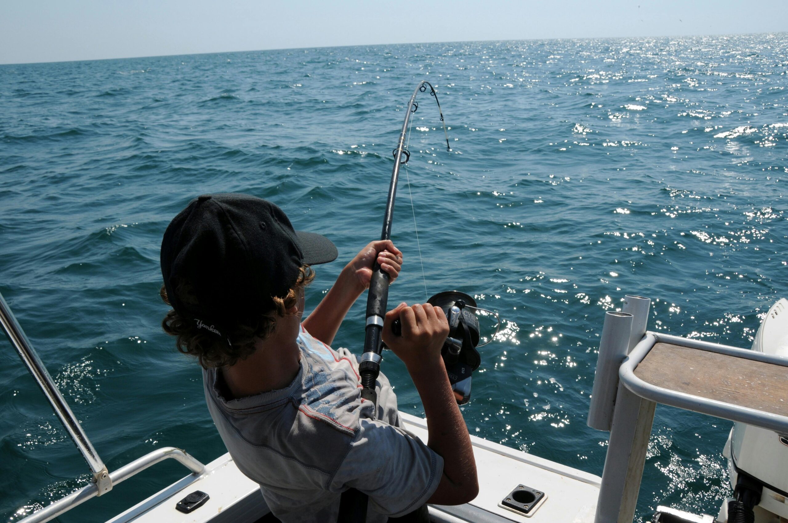 man fishing in sea