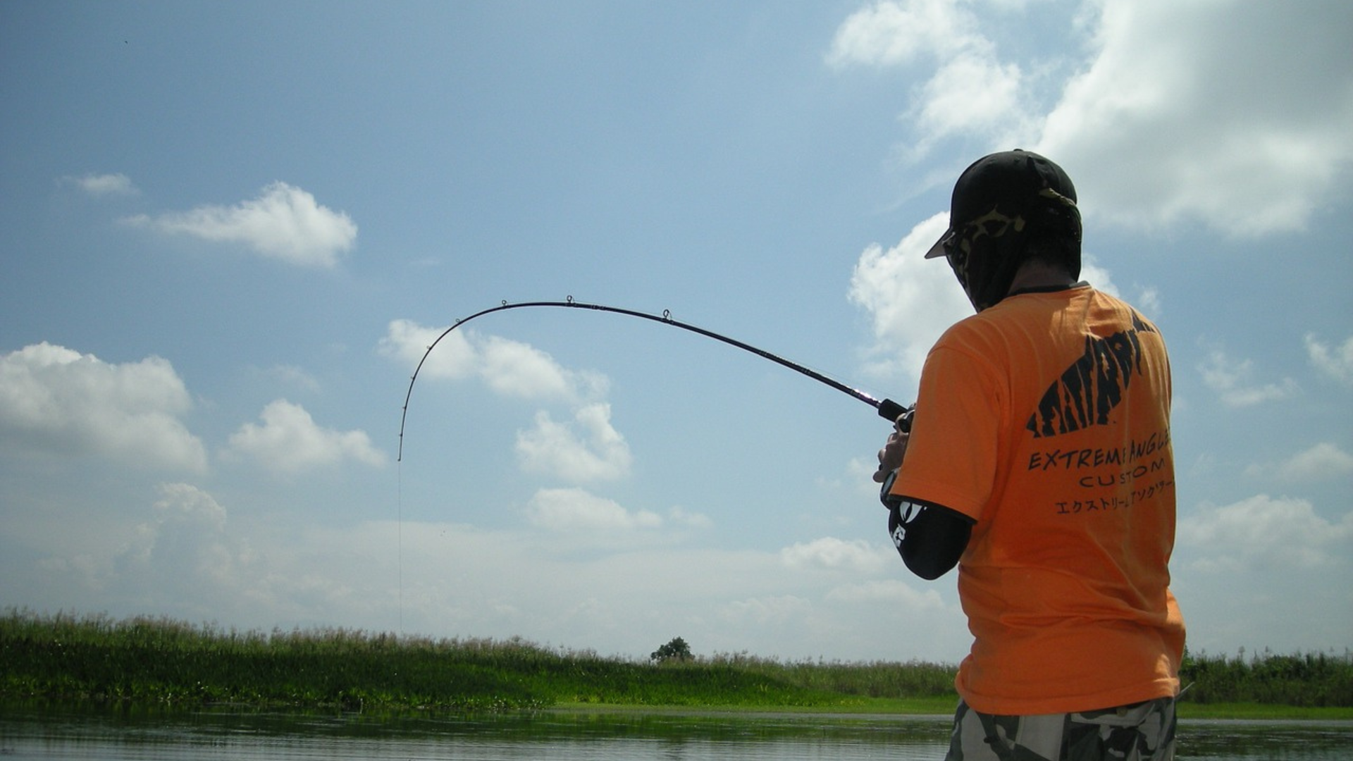 man fishing in summer